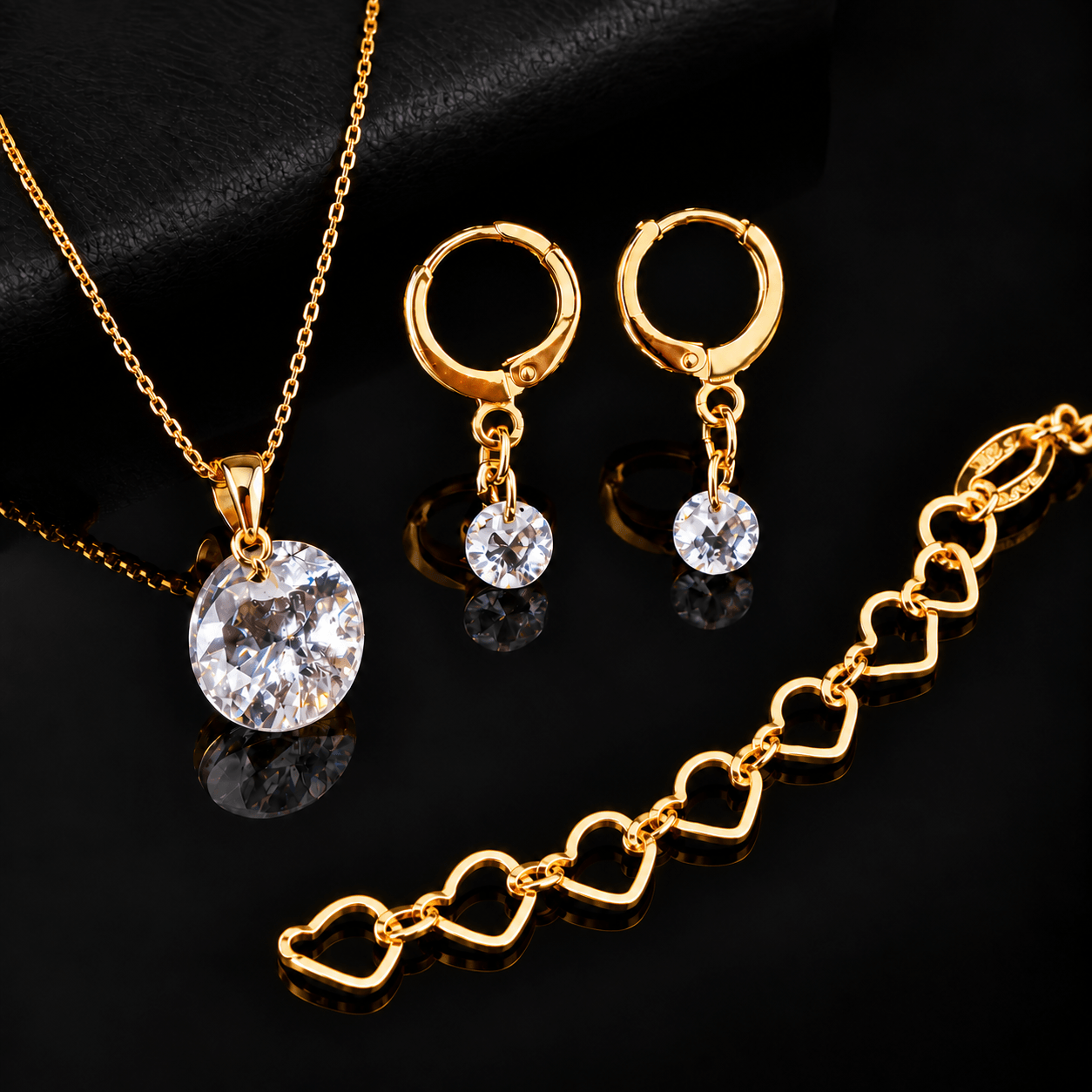 Kit Toque de Luz com colar ponto de luz, brinco argolinha e pulseira de corações
